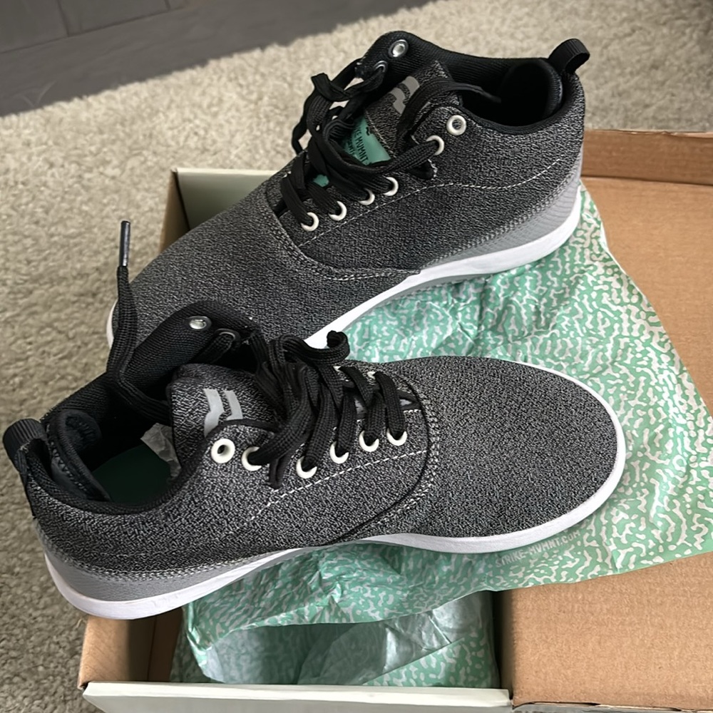 Chill Pill Mid. Dark heather gray, comes to mid ankle. White sole, 2 lace colors